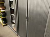 a large metal cabinet in the middle of a room