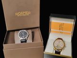 a box with a watch inside of it and a box with a watch inside of it