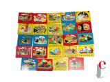 many children ' s books that are on the table