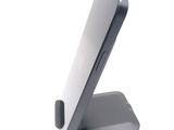 a cell phone that is sitting on top of a stand