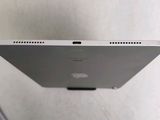 an image of a close up of a laptop computer on a table