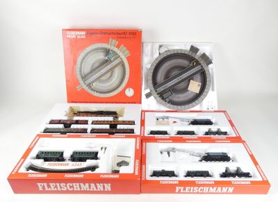 a box with a train set in it and a box with a train set in it