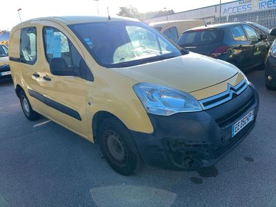 yellow citrole van parked in a parking lot with other cars in the background
