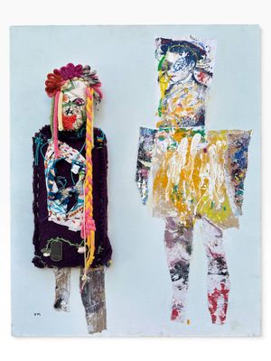 two pieces of art are displayed on a white surface
