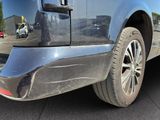 a close up of the rear end of a car with mud on it