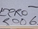 a picture of a picture of a person writing on a piece of paper