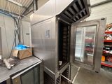 an image of a commercial kitchen with stainless steel appliances