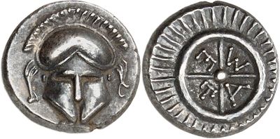 a close up of a silver coin with an image of a woman on it