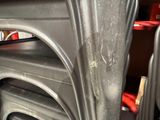 a close up of a stack of chairs in a room