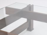 a glass table with a wooden base and a glass top