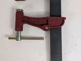 a couple of clamps sitting next to each other on a table