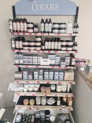 a shelf with many different types of skin care products on it