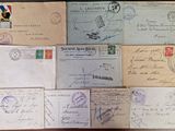 many old letters and envelopes on the table