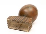 a piece of chocolate next to a piece of chocolate