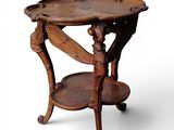a wooden table with a tray on top of it