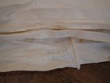 a piece of fabric that has been folded over on the floor