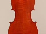 an old violin with a wooden back and a long neck