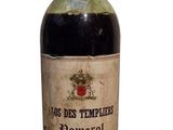 a bottle of wine that is sitting on a table
