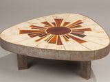 a small table with a geometric design on it
