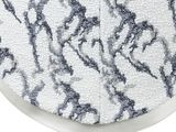 a close up of a toilet seat with a pattern on it