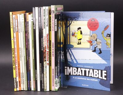 a lot of books that are sitting on a table