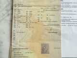 un document sur lequel figure la photo d'un passeport