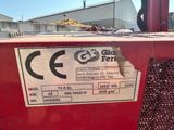 a close up of a label on a red machine