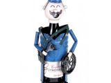 a figurine of a man with a bicycle in his hand