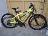 a bike that is parked in front of a door