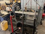 a picture of a garage with a lot of tools in it