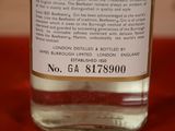 a close up of a bottle of alcohol on a table