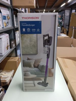 a box with a vacuum on a table in a store