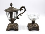 pair of antique silver plated teapots and a glass bowl