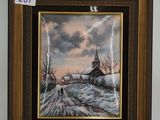 un tableau représentant une église par temps de neige est accroché au mur