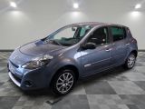 a picture of a small blue car parked in a garage