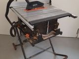 a table with a saw on it in a room