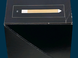 a black box with a pencil in it on a blue background