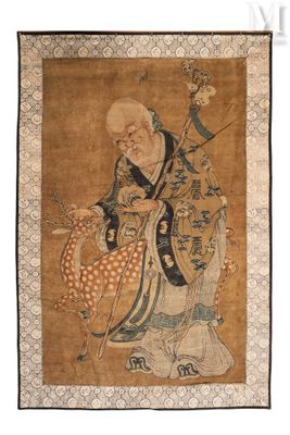 une ancienne peinture chinoise représentant un homme avec une chèvre