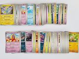 a lot of pokemon cards on the table together