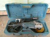 a blue tool case with tools in it on the floor