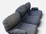 une photo d'un canapé sur lequel est posé un fauteuil inclinable