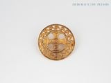 an image of a gold ring with a design on it