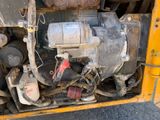 an image of a close up of the engine of a construction vehicle