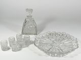 a lot of glass items that are sitting on a table