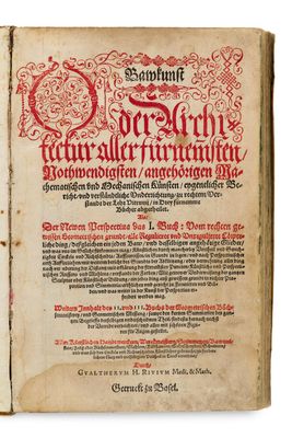 un vieux livre sur lequel figurent des inscriptions rouges et noires