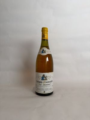 a bottle of wine that is sitting on a table
