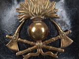 an image of a helmet with a badge on it