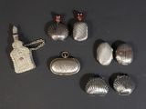 a lot of silver items that are on a table