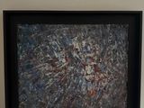 a picture of a painting hanging on the wall