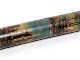a small tube with a picture on it on a white surface